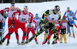 16.12.2012, Canmore, Canada (CAN):  Maurice Manificat (FRA), Fischer, Swix, Rottefella, One Way followed by Petter Eliassen (NOR), Fischer, Swix, Alpina, Rottefella and Chris Andre Jespersen (NOR), Rossignol, Start, Rottefella, Skigo - FIS world cup cross-country, skiathlon men, Canmore (CAN). www.nordicfocus.com. © Roycroft/NordicFocus. Every downloaded picture is fee-liable.