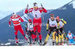 16.12.2012, Canmore, Canada (CAN): (l-r) Sjur Roethe (NOR), Fischer, KV+, Salomon, Swix , Chris Andre Jespersen (NOR), Rossignol, Start, Rottefella, Skigo and Jens Filbrich (GER), Rossignol, One Way, Rottefella, Adidas  - FIS world cup cross-country, skiathlon men, Canmore (CAN). www.nordicfocus.com. © Roycroft/NordicFocus. Every downloaded picture is fee-liable.