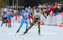 16.12.2012, Canmore, Canada (CAN): Maurice Manificat (FRA), Fischer, Swix, Rottefella, One Way followed by Roland Clara (ITA), Fischer, Swix, Rottefella  - FIS world cup cross-country, skiathlon men, Canmore (CAN). www.nordicfocus.com. © Roycroft/NordicFocus. Every downloaded picture is fee-liable.
