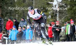 16.12.2012, Canmore, Canada (CAN): Erik Bjornsen (USA) Fischer - FIS world cup cross-country, skiathlon men, Canmore (CAN). www.nordicfocus.com. © Roycroft/NordicFocus. Every downloaded picture is fee-liable.