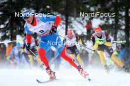 16.12.2012, Canmore, Canada (CAN): Evgeniy Belov (RUS), Fischer, Swix, Alpina, Rottefella, Adidas - FIS world cup cross-country, skiathlon men, Canmore (CAN). www.nordicfocus.com. © Roycroft/NordicFocus. Every downloaded picture is fee-liable.