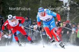 16.12.2012, Canmore, Canada (CAN): (l-r) Eldar Roenning (NOR), Rossignol, Swix, Rottefella, Evgenji Dementiev (RUS), Madshus, Salomon, Swix, adidas - FIS world cup cross-country, skiathlon men, Canmore (CAN). www.nordicfocus.com. © Roycroft/NordicFocus. Every downloaded picture is fee-liable.