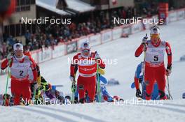 16.12.2012, Canmore, Canada (CAN): (l-r) Martin Johnsrud Sundby (NOR), Sjur Roethe (NOR), Fischer, KV+, Salomon, Swix, Chris Andre Jespersen (NOR), Rossignol, Start, Rottefella, Skigo - FIS world cup cross-country, skiathlon men, Canmore (CAN). www.nordicfocus.com. © Roycroft/NordicFocus. Every downloaded picture is fee-liable.