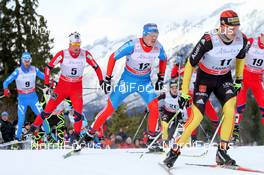 16.12.2012, Canmore, Canada (CAN): in front Jens Filbrich (GER) Rossignol, adidas, One Way, Rottefella  - FIS world cup cross-country, skiathlon men, Canmore (CAN). www.nordicfocus.com. © Roycroft/NordicFocus. Every downloaded picture is fee-liable.
