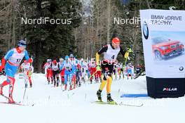 16.12.2012, Canmore, Canada (CAN): in front Tobias Angerer (GER) Fischer, Rottefella, adidas, One Way  - FIS world cup cross-country, skiathlon men, Canmore (CAN). www.nordicfocus.com. © Roycroft/NordicFocus. Every downloaded picture is fee-liable.