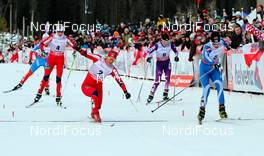 16.12.2012, Canmore, Canada (CAN): (l-r) Kristin Steira (NOR), Madshus, One Way, Salomon, Swix, Vibeke Skofterud (NOR), Fischer, One Way, Alpina, Rottefella, Yoko, Masako Ishida (JPN), Salomon, Swix and Anne Kylloenen (FIN), Fischer, Swix, Rottefella, Craft  - FIS world cup cross-country, skiathlon women, Canmore (CAN). www.nordicfocus.com. © Roycroft/NordicFocus. Every downloaded picture is fee-liable.