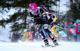 16.12.2012, Canmore, Canada (CAN):  Kikkan Randall (USA), Fischer, Swix, Salomon - FIS world cup cross-country, skiathlon women, Canmore (CAN). www.nordicfocus.com. © Roycroft/NordicFocus. Every downloaded picture is fee-liable.