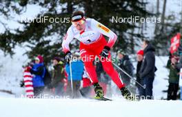 16.12.2012, Canmore, Canada (CAN): Justyna Kowalczyk (POL), Fischer, Swix, Rottefella  - FIS world cup cross-country, skiathlon women, Canmore (CAN). www.nordicfocus.com. © Roycroft/NordicFocus. Every downloaded picture is fee-liable.