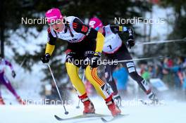 16.12.2012, Canmore, Canada (CAN): Denise Hermann (GER), Fischer, Swix, Apina, Rottefella, Adidas  - FIS world cup cross-country, skiathlon women, Canmore (CAN). www.nordicfocus.com. © Roycroft/NordicFocus. Every downloaded picture is fee-liable.