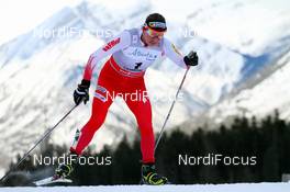 16.12.2012, Canmore, Canada (CAN):  Justyna Kowalczyk (POL), Fischer, Swix, Rottefella - FIS world cup cross-country, skiathlon women, Canmore (CAN). www.nordicfocus.com. © Roycroft/NordicFocus. Every downloaded picture is fee-liable.