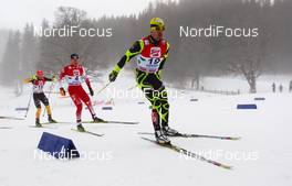 16.12.2012, Ramsau, Austria (AUT):  Sebastian Lacroix (FRA), Atomic, Salomon, One Way followed by Bernhard Gruber (AUT), Fischer, Rottefella, Loeffler and Johannes Rydzek (GER), Fischer, Swix, Rottefella, Adidas - FIS world cup nordic combined, individual gundersen HS98/10km, Ramsau (AUT). www.nordicfocus.com. © Laiho/NordicFocus. Every downloaded picture is fee-liable.