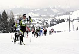 28.01.2012, Tannheimer Tal - Bad Hindelang, Austria (AUT) - Germany (GER): start of the classic race with Tannheim village in the background - Skitrail Tannheimertal, Bad Hindelang (GER). www.nordicfocus.com. © Felgenhauer/NordicFocus. Every downloaded picture is fee-liable.