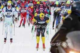 29.01.2012, Val di Fassa / Val di Fiemme , Italy (ITA):  start, l-r: Anders Aukland (NOR), Atomic, Team Xtra, KV+, Petter Northug (NOR), Fischer, Rottefella, Alpina, Ski Go, Swix, United Bakeries   - FIS Marathon Cup Marcialonga, Val di Fassa / Val di Fiemme (ITA). www.nordicfocus.com. © Hemmersbach/NordicFocus. Every downloaded picture is fee-liable.