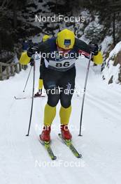 29.01.2012, Val di Fassa / Val di Fiemme , Italy (ITA): Petter Northug (NOR), Fischer, Rottefella, Alpina, Ski Go, Swix, United Bakeries    at the uphill of Soraga - FIS Marathon Cup Marcialonga, Val di Fassa / Val di Fiemme (ITA). www.nordicfocus.com. © Hemmersbach/NordicFocus. Every downloaded picture is fee-liable.