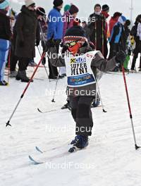 11.-12.02.2012, St. Johann, Austria (AUT): a young athlete of the Superminikoasa - Int. Tiroler Koasalauf, St. Johann (AUT). www.nordicfocus.com. © Felgenhauer/NordicFocus. Every downloaded picture is fee-liable.