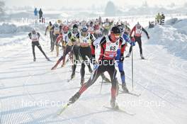 11.-12.02.2012, St. Johann, Austria (AUT): start of the 50k race with Sebastian Bech (GER), Loeffler, Fischer in front - Int. Tiroler Koasalauf, St. Johann (AUT). www.nordicfocus.com. © Felgenhauer/NordicFocus. Every downloaded picture is fee-liable.