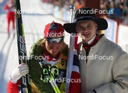 04.03.2012, Mora, Sweden (SWE): todays winner Vibeke Skofterud (NOR), Fischer, Rottefella, Alpina, One Way together with the Kransmas - FIS Marathon Cup Vasaloppet, Mora (SWE). www.nordicfocus.com. © Hemmersbach/NordicFocus. Every downloaded picture is fee-liable.