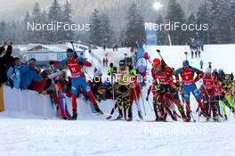 13.01.2013, Ruhpolding, Germany (GER): L-R: Anton Shipulin (RUS), Fischer, Rottefella, adidas, Martin Fourcade (FRA), Rossignol, Rottefella, OneWay, Toko, Ondrej Moravec (CZE), Fischer, Rottefella, Alpina, Swix, Evgeniy Garanichev (RUS), Madshus, Rottefella, Swix, adidas, Henrik l'Abee-Lund (NOR), Fischer, Rottefella, Swix, ODLO - IBU world cup biathlon, mass men, Ruhpolding (GER). www.nordicfocus.com. © Manzoni/NordicFocus. Every downloaded picture is fee-liable.