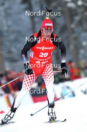 13.01.2013, Ruhpolding, Germany (GER): Scott Perras (CAN), Salomon, Swix - IBU world cup biathlon, mass men, Ruhpolding (GER). www.nordicfocus.com. © Manzoni/NordicFocus. Every downloaded picture is fee-liable.