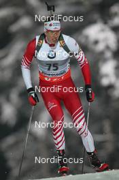 12.01.2013, Ruhpolding, Germany (GER): Julian Eberhard (AUT), Atomic  - IBU world cup biathlon, sprint men, Ruhpolding (GER). www.nordicfocus.com. © Manzoni/NordicFocus. Every downloaded picture is fee-liable.