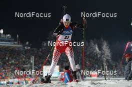11.01.2013, Ruhpolding, Germany (GER): Zina Kocher (CAN), Atomic, Leki, Odlo - IBU world cup biathlon, sprint women, Ruhpolding (GER). www.nordicfocus.com. © Manzoni/NordicFocus. Every downloaded picture is fee-liable.