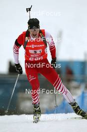 20.01.2013, Antholz, Italy (ITA): Simon Eder (AUT), Fischer, Rottefella, Swix - IBU world cup biathlon, relay men, Antholz (ITA). www.nordicfocus.com. © Manzoni/NordicFocus. Every downloaded picture is fee-liable.