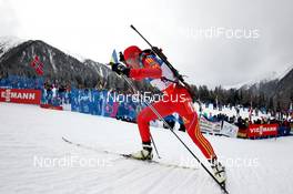 20.01.2013, Antholz, Italy (ITA): Jialin Tang (CHN), Fischer, Rottefella, Swix, adidas - IBU world cup biathlon, relay women, Antholz (ITA). www.nordicfocus.com. © Manzoni/NordicFocus. Every downloaded picture is fee-liable.