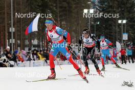 17.02.2013, Nove Mesto, Czech Republic (CZE): Dmitry Malyshko (RUS), Fischer, Rottefella, Alpina, Leki, adidas leads Benjamin Weger (SUI), Atomic, Alpina, Swix, Oakley, Toko, ODLO - IBU world championships biathlon, mass men, Nove Mesto (CZE). www.nordicfocus.com. © Manzoni/NordicFocus. Every downloaded picture is fee-liable.