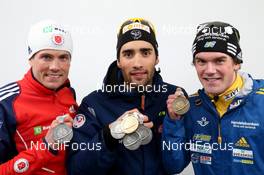 14.02.2013, Nove Mesto, Czech Republic (CZE): L-R: Tim Burke (USA), Rossignol, Rottefella, OneWay, adidas, Martin Fourcade (FRA), Rossignol, Rottefella, OneWay, Toko, Fredrik Lindstroem (SWE), Fischer, Rottefella, Swix, adidas - IBU world championships biathlon, medals, Nove Mesto (CZE). www.nordicfocus.com. © Manzoni/NordicFocus. Every downloaded picture is fee-liable.