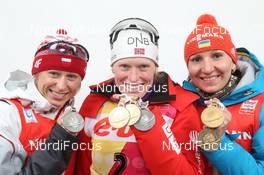 10.02.2013, Nove Mesto, Czech Republic (CZE): L-R: Krystyna Palka (POL), Fischer, Rottefella, Swix, Tora Berger (NOR), Fischer, Rottefella, Odlo, Olena Pidhrushna (UKR), Fischer, Rottefella, Swix - IBU world championships biathlon, medals, Nove Mesto (CZE). www.nordicfocus.com. © Manzoni/NordicFocus. Every downloaded picture is fee-liable.