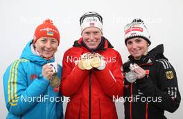 13.02.2013, Nove Mesto, Czech Republic (CZE): L-R: Valj Semerenko (UKR), Fischer, Salomon, Swix, Tora Berger (NOR), Fischer, Rottefella, Odlo, Andrea Henkel (GER), Fischer, Rottefella, Swix, adidas, Toko - IBU world championships biathlon, medals, Nove Mesto (CZE). www.nordicfocus.com. © Manzoni/NordicFocus. Every downloaded picture is fee-liable.