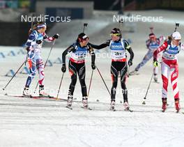 15.02.2013, Nove Mesto, Czech Republic (CZE): Patricia Jost (SUI), Rossignol, Rottefella, Leki, ODLO, Casco, Selina Gasparin (SUI), Rossignol, Rottefella, Alpina, Swix, ODLO, CASCO - IBU world championships biathlon, relay women, Nove Mesto (CZE). www.nordicfocus.com. © Manzoni/NordicFocus. Every downloaded picture is fee-liable.