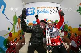 09.02.2013, Nove Mesto, Czech Republic (CZE): Anders Besseberg (NOR), president of IBU, International Biathlon Union, Emil Hegle Svendsen (NOR), Madshus, Rottefella, Swix, Odlo - IBU world championships biathlon, sprint men, Nove Mesto (CZE). www.nordicfocus.com. © Manzoni/NordicFocus. Every downloaded picture is fee-liable.