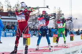 01.12.2013, Oestersund, Sweden (SWE): Ann Kristin Aafedt Flatland (NOR), Olga Zaitseva (RUS), Darya Domracheva (BLR) - IBU world cup biathlon, pursuit women, Oestersund (SWE). www.nordicfocus.com. © Manzoni/NordicFocus. Every downloaded picture is fee-liable.