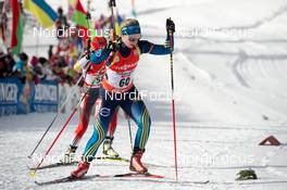 08.12.2013, Hochfilzen, Austria (AUT): Yan Zhang (CHN), Mona Brorsson (SWE), (l-r) - IBU world cup biathlon, pursuit women, Hochfilzen (AUT). www.nordicfocus.com. © Wukits/NordicFocus. Every downloaded picture is fee-liable.