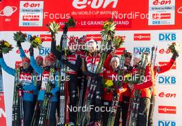 12.12.2013, Annecy-Le Grand Bornand, France (FRA): The Teams of Ukraine, Germany and Norway on the podium - IBU world cup biathlon, relay women, Annecy-Le Grand Bornand (FRA). www.nordicfocus.com. © Manzoni/NordicFocus. Every downloaded picture is fee-liable.