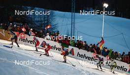 01.01.2013, Val Muestair, Switzerland (SUI): a group of women climbing up the hill - FIS world cup cross-country, tour de ski, individual sprint, Val Muestair (SUI). www.nordicfocus.com. © Felgenhauer/NordicFocus. Every downloaded picture is fee-liable.