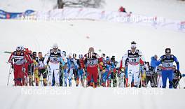 05.01.2013, Val di Fiemme, Italy (ITA): men in the uphill, with Finn Haagen Krogh (NOR), Petter Northug (NOR), Daniel Richardsson (SWE), Tord Asle Gjerdalen (NOR), Calle Halfvarsson (SWE), Johan Olsson (SWE), Ivan Babikov (CAN), Lukas Bauer (CZE) - FIS world cup cross-country, tour de ski, mass men, Val di Fiemme (ITA). www.nordicfocus.com. © Felgenhauer/NordicFocus. Every downloaded picture is fee-liable.