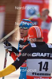 05.01.2013, Val di Fiemme, Italy (ITA): Alexander Legkov (RUS) and Tobias Angerer (GER) - FIS world cup cross-country, tour de ski, mass men, Val di Fiemme (ITA). www.nordicfocus.com. © Felgenhauer/NordicFocus. Every downloaded picture is fee-liable.