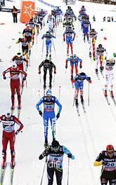 05.01.2013, Val di Fiemme, Italy (ITA): a big group takes the uphill - FIS world cup cross-country, tour de ski, mass men, Val di Fiemme (ITA). www.nordicfocus.com. © Felgenhauer/NordicFocus. Every downloaded picture is fee-liable.