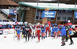 05.01.2013, Val di Fiemme, Italy (ITA): men's start with Maxim Vylegzhanin (RUS), Dario Cologna (SUI), Petter Northug (NOR), Dmitriy Japarov (RUS) in front - FIS world cup cross-country, tour de ski, mass men, Val di Fiemme (ITA). www.nordicfocus.com. © Felgenhauer/NordicFocus. Every downloaded picture is fee-liable.