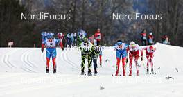 05.01.2013, Val di Fiemme, Italy (ITA): a big group chasing the leading women - FIS world cup cross-country, tour de ski, mass women, Val di Fiemme (ITA). www.nordicfocus.com. © Felgenhauer/NordicFocus. Every downloaded picture is fee-liable.