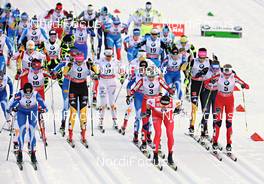 05.01.2013, Val di Fiemme, Italy (ITA): women's start with Anne Kylloenen (FIN), Heidi Weng (NOR), Denise Herrmann (GER), Anna Haag (SWE), Therese Johaug (NOR), Justyna Kowalczyk (POL), Kristin Stoermer Steira (NOR) - FIS world cup cross-country, tour de ski, mass women, Val di Fiemme (ITA). www.nordicfocus.com. © Felgenhauer/NordicFocus. Every downloaded picture is fee-liable.