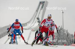 16.03.2013, Oslo, Norway (NOR): (l-r) Alexander Legkov (RUS), Rossignol, Swix, Rottefella, Adidas, Martin Johnsrud Sundby (NOR), Fischer, KV+, Rottefella, Swix and Sjur Roethe (NOR), Fischer, KV+, Salomon, Swix  - FIS world cup cross-country, mass men, Oslo (NOR). www.nordicfocus.com. © Laiho/NordicFocus. Every downloaded picture is fee-liable.