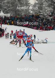16.03.2013, Oslo, Norway (NOR): Roland Clara (ITA), Fischer, Swix, Rottefella followed by Alexander Legkov (RUS), Rossignol, Swix, Rottefella, Adidas and Petter Eliassen (NOR), Fischer, Swix, Alpina, Rottefella - FIS world cup cross-country, mass men, Oslo (NOR). www.nordicfocus.com. © Laiho/NordicFocus. Every downloaded picture is fee-liable.