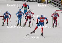 16.03.2013, Oslo, Norway (NOR): (l-r) Ilia Chernousov (RUS), Rossignol, Swix, Rottefella, Adidas, Roland Clara (ITA), Fischer, Swix, Rottefella, Petter Eliassen (NOR), Fischer, Swix, Alpina, Rottefella, Alexander Legkov (RUS), Rossignol, Swix, Rottefella, Adidas and Martin Johnsrud Sundby (NOR), Fischer, KV+, Rottefella, Swix - FIS world cup cross-country, mass men, Oslo (NOR). www.nordicfocus.com. © Laiho/NordicFocus. Every downloaded picture is fee-liable.