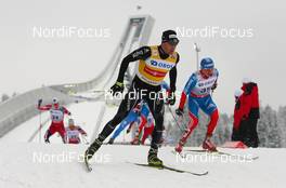 16.03.2013, Oslo, Norway (NOR): Dario Cologna (SUI), Fischer, Swix, Alpina, Rottefella, Odlo - FIS world cup cross-country, mass men, Oslo (NOR). www.nordicfocus.com. © Laiho/NordicFocus. Every downloaded picture is fee-liable.