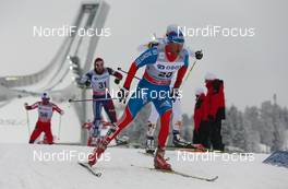 16.03.2013, Oslo, Norway (NOR): Konstantin Glavatskikh (RUS), Fischer, Swix, Alpina, Rottefella, Adidas - FIS world cup cross-country, mass men, Oslo (NOR). www.nordicfocus.com. © Laiho/NordicFocus. Every downloaded picture is fee-liable.