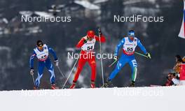 27.02.2013, Val di Fiemme, Italy (ITA): (l-r) Tero Similae (FIN), Fischer, Swix, Alpina, Wenlong Xu (CHN), Peltonen, Rex, Alpina, Adidas and David Hofer (ITA), Fischer, Rottefella   - FIS nordic world ski championships, cross-country, 15km men, Val di Fiemme (ITA). www.nordicfocus.com. © Laiho/NordicFocus. Every downloaded picture is fee-liable.