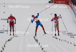 21.02.2013, Val di Fiemme, Italy (ITA):  (l-r) Petter Northug (NOR), Fischer, Swix, Alpina, Rottefella, Nikita Kriukov (RUS), Rossignol, Swix, Rottefella, Adidas and Alex Harvey (CAN), Fischer, Swix, Salomon, One Way - FIS nordic world ski championships, cross-country, individual sprint, Val di Fiemme (ITA). www.nordicfocus.com. © Laiho/NordicFocus. Every downloaded picture is fee-liable.